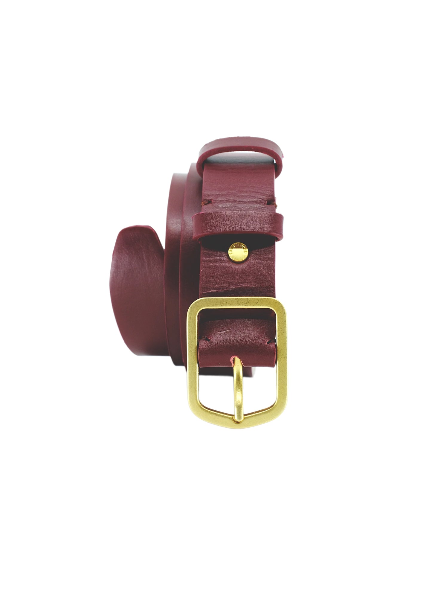 Vertical coiled view of Classic Red Mist burgundy leather belt with a matte gold buckle and matching gold rivet.