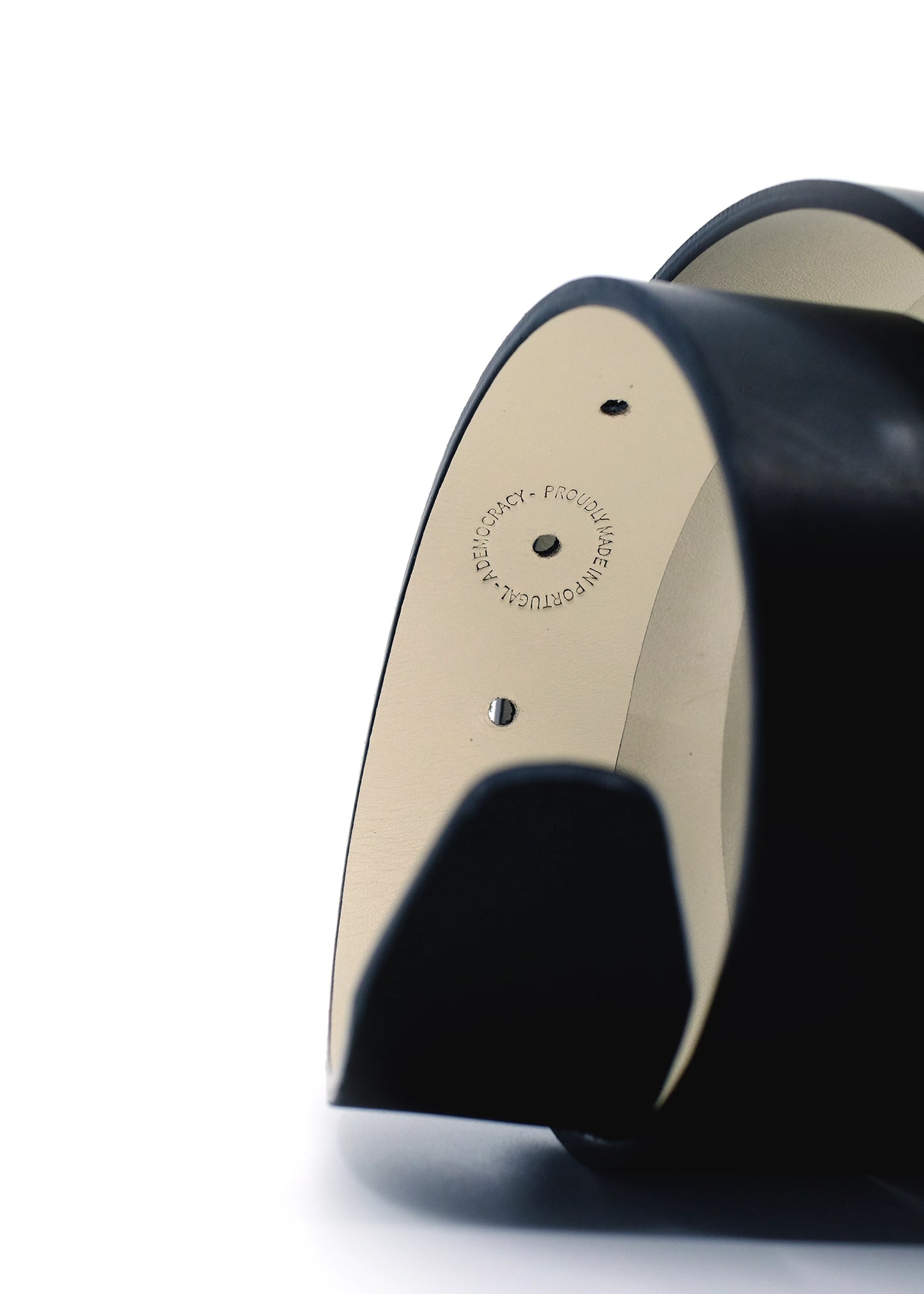 Interior view of Classic Pitch Black belt with "Proudly Made in Portugal" stamp on cream leather.