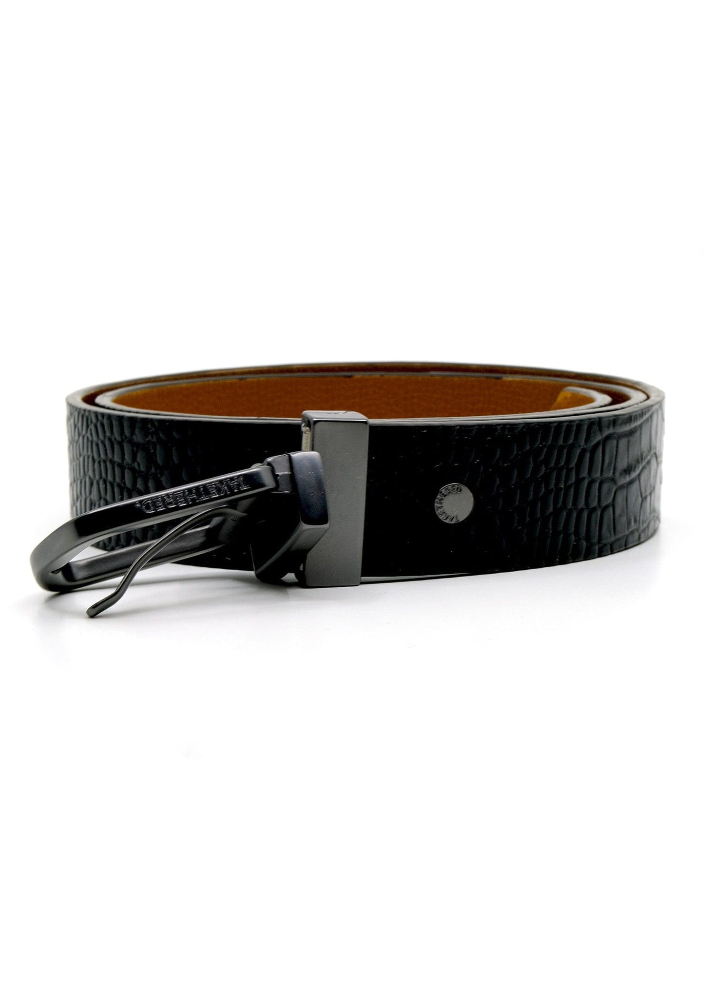 Side view of coiled Pitch Black alligator-embossed Two-Face Belt with a matte black reversible buckle.