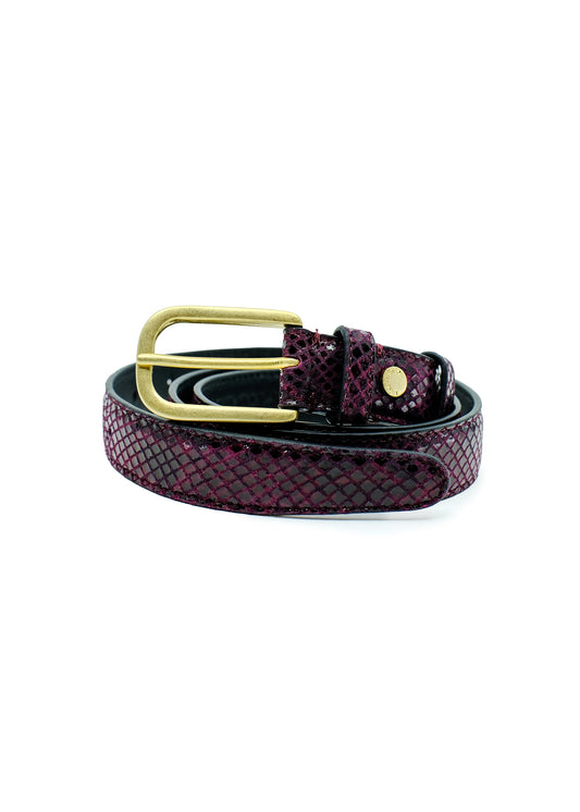 Coiled Dark Plum snakeskin embossed belt with a gold buckle, isolated on a white background.