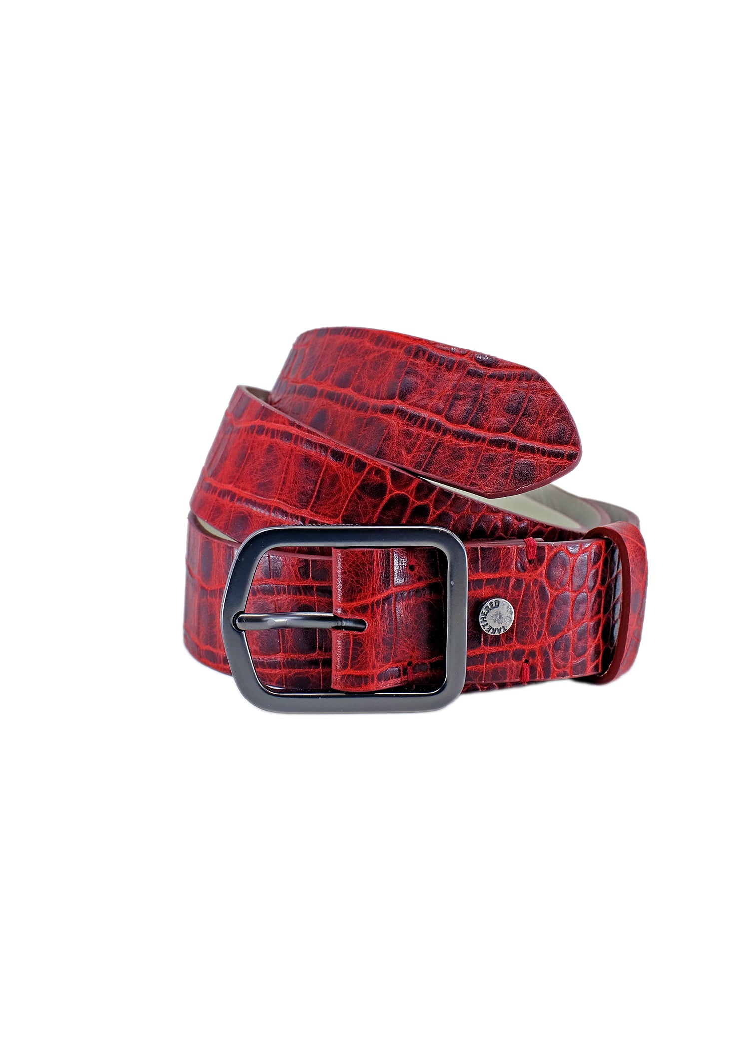Coiled Pink Grape alligator embossed leather belt with a sleek black dull brass buckle, isolated on a white background.
