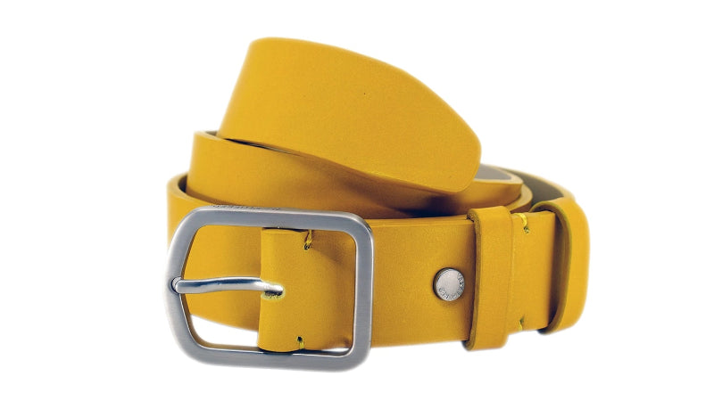 Horizonally coiled view of Submarine Yellow smooth leather belt with weathered silver buckle and matching silver rivet and matching double keepers.