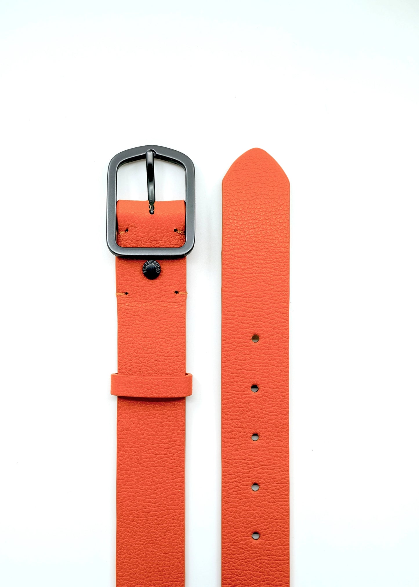 Top-down view of the orange Tatooine Sunset Grunge Belt in pebble-grain leather with a matte black buckle.