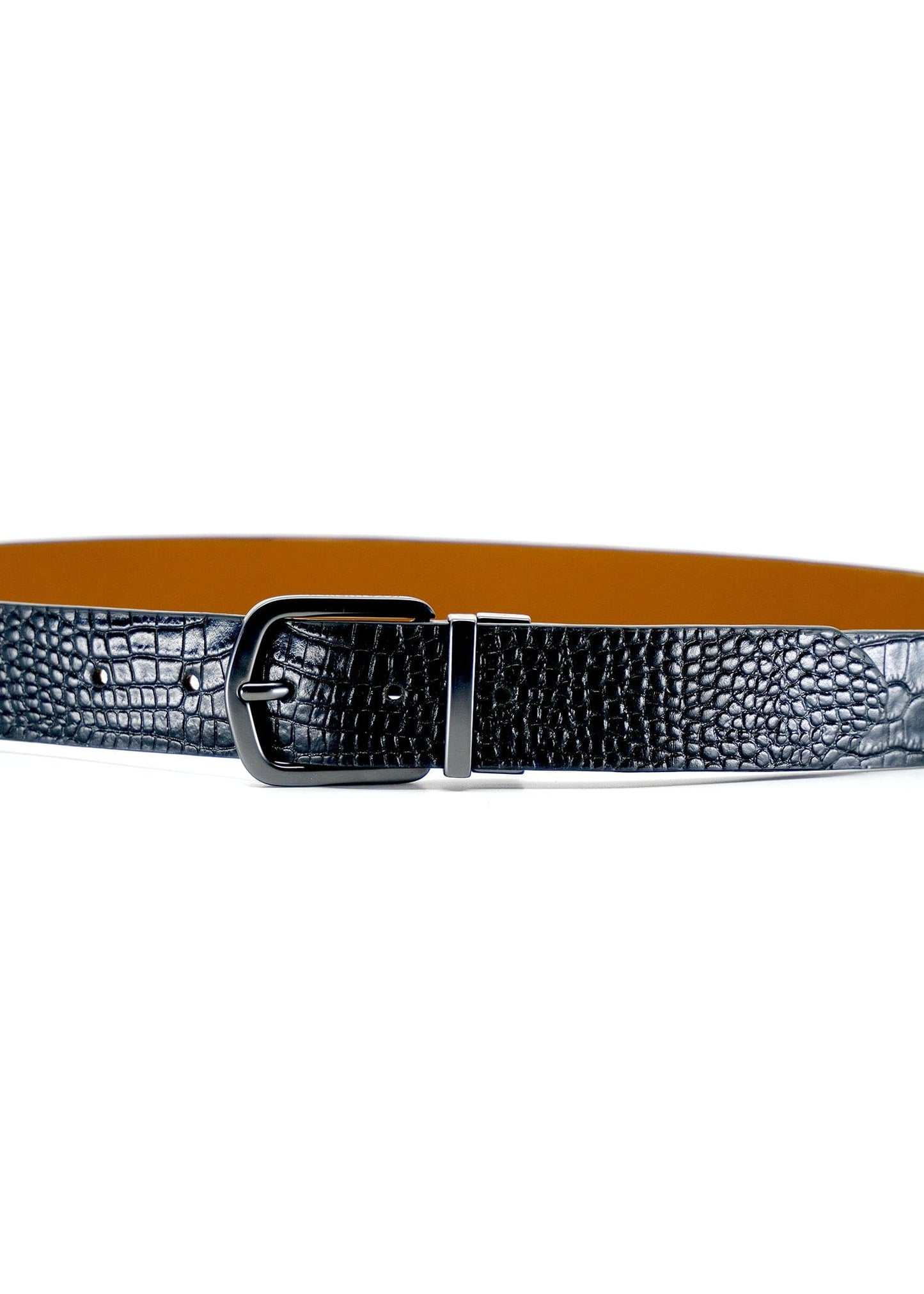 Horizontal close-up of the Pitch Black alligator-embossed Two-Face Belt with a matte black reversible buckle.