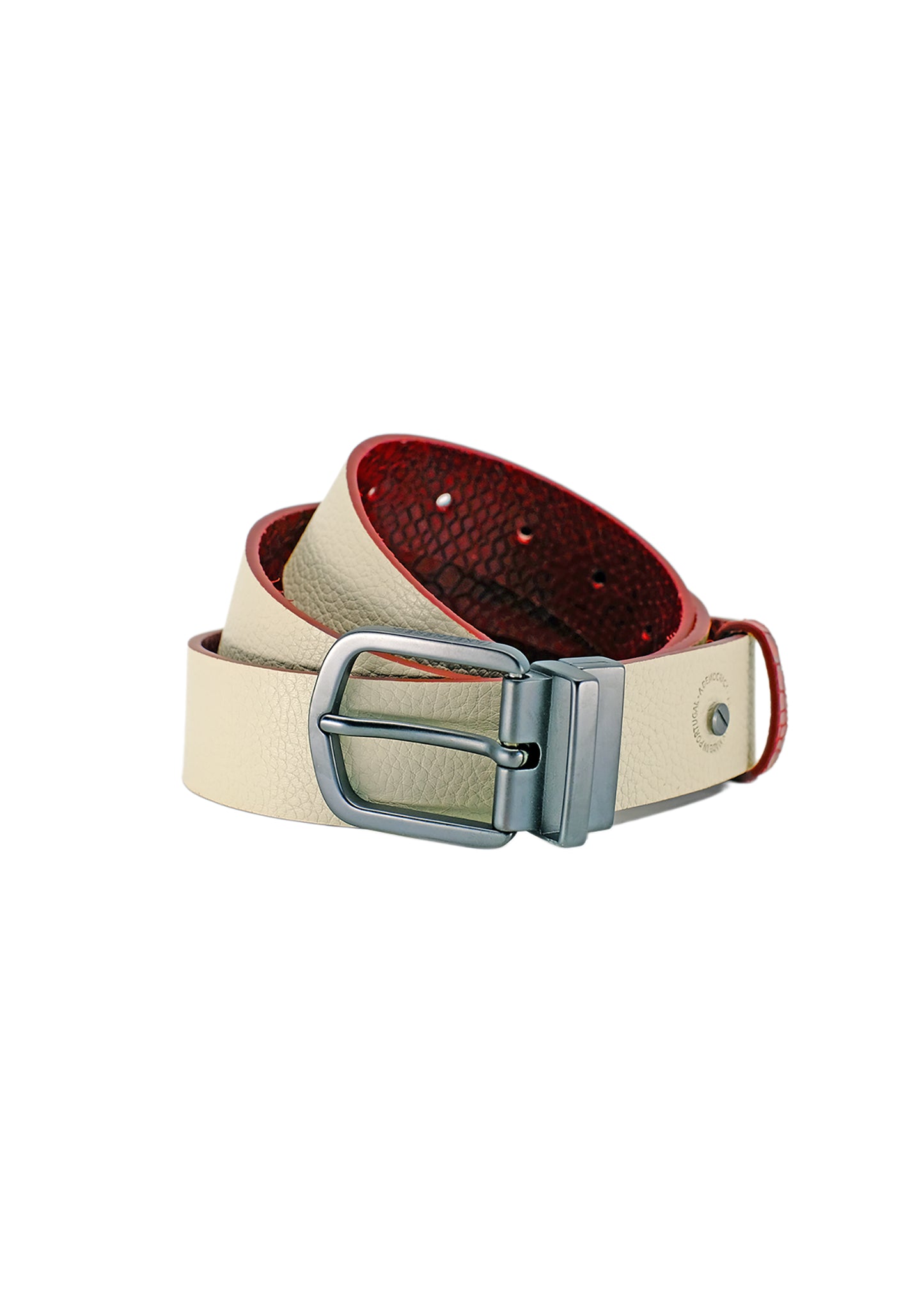 Coiled Two-Face belt flipped to the Desert White side, featuring smooth off-white pebbled leather and the reversible matte black buckle hardware.