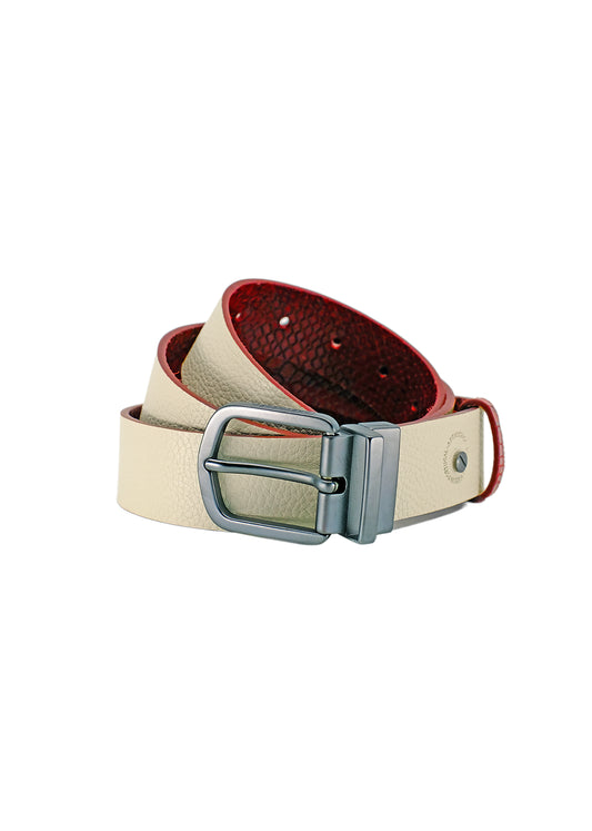 Coiled Two-Face belt flipped to the Desert White side, featuring smooth off-white pebbled leather and the reversible matte black buckle hardware.