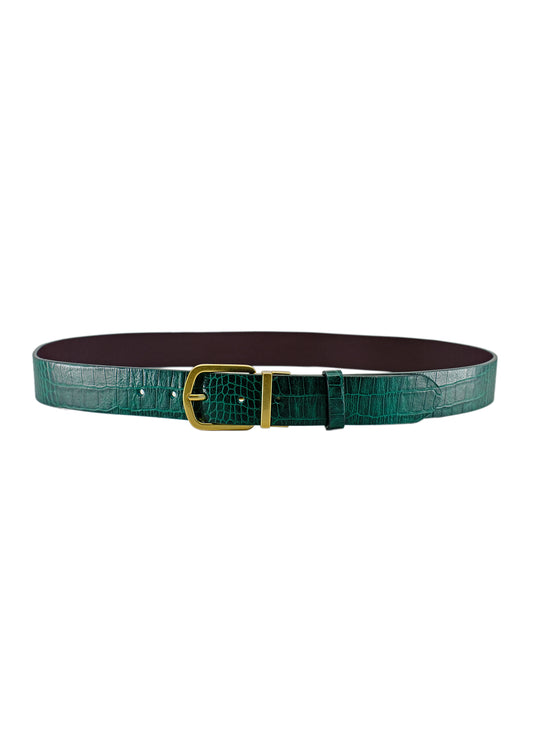 Full horizontal view of the Two-Face belt, highlighting the vibrant Ruby Green crocodile texture on the outside and a glimpse of the deep Red Mist interior.