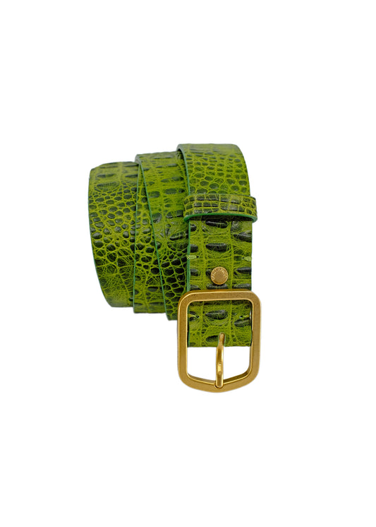 Vertical profile of the Atomic Green alligator embossed belt, coiled to show the gold-tone buckle and the vibrant, high-contrast green texture.