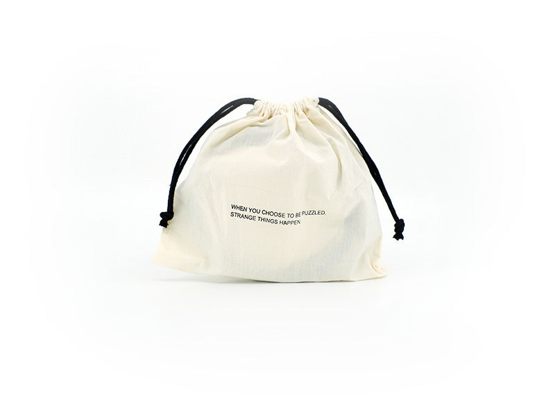 Product picture of a cotton bag for belt in cream white and text when you choose to be puzzled strange things happen.